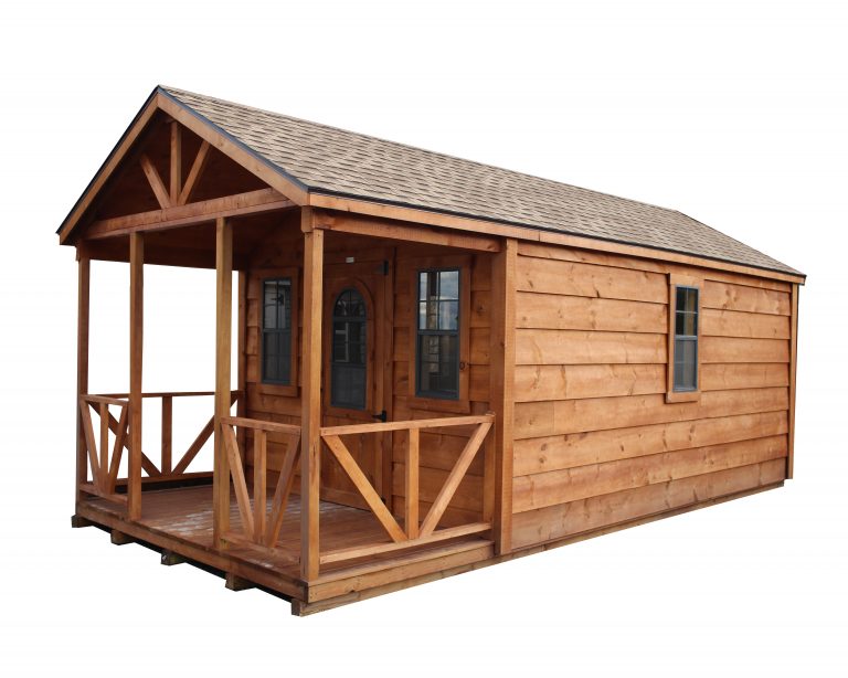An A-Frame example with additional porch, shingle roof and white pine siding.